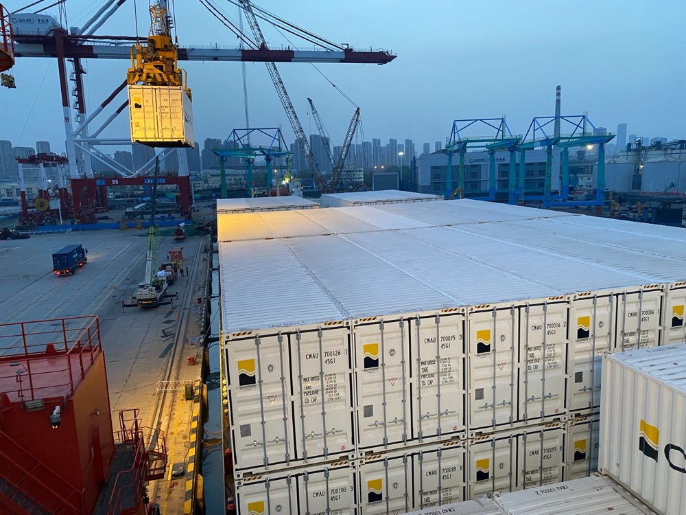 Clarion containers being loaded at a port in China